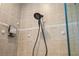 Shower features beige tile work and a handheld shower head at 3267 Regal Crest Dr, Longwood, FL 32779