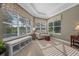 Cozy sitting area with a large window overlooking the landscaped yard at 3267 Regal Crest Dr, Longwood, FL 32779