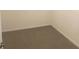 This walk-in closet is carpeted with neutral walls and trim at 335 Ridgemark Ave, Groveland, FL 34736