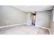 The bedroom has light gray walls and floors designed to look like white washed wood at 3362 Janet St, Apopka, FL 32712