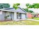 Charming single-story home with a well-maintained lawn and driveway, attached one car garage at 3362 Janet St, Apopka, FL 32712