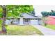 Charming single-story home with a well-maintained lawn and driveway, attached one car garage at 3362 Janet St, Apopka, FL 32712