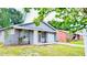 Charming single-story home with a well-maintained lawn and driveway, attached one car garage at 3362 Janet St, Apopka, FL 32712