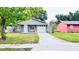 Charming single-story home with a well-maintained lawn and driveway, attached one car garage at 3362 Janet St, Apopka, FL 32712