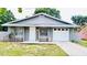 Charming single-story home with a well-maintained lawn and driveway, attached one car garage at 3362 Janet St, Apopka, FL 32712