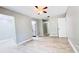Open living room featuring tiled floors and neutral paint tones at 3362 Janet St, Apopka, FL 32712