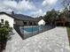 Backyard with in-ground swimming pool, screened fence and plenty of space for entertaining at 3417 Bay Meadow Ct, Windermere, FL 34786