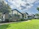 Charming home with lush landscaping and mature trees offers great curb appeal at 3417 Bay Meadow Ct, Windermere, FL 34786