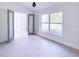 Stylish secondary living room with natural light, and modern glass doors creates a comfortable and inviting space at 3417 Bay Meadow Ct, Windermere, FL 34786