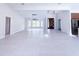 Bright living room with modern lighting, beautiful windows, and an open floor plan offers flexible living at 3417 Bay Meadow Ct, Windermere, FL 34786