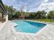 Backyard with a screened inground swimming pool and pergola, perfect for outdoor relaxation at 3417 Bay Meadow Ct, Windermere, FL 34786