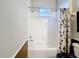 Bright bathroom featuring combined shower and tub with white tiling and a vanity at 3559 Victoria Pines Dr # 280, Orlando, FL 32829
