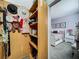 Spacious walk-in closet conveniently located near the primary bedroom providing extra storage at 3559 Victoria Pines Dr # 280, Orlando, FL 32829