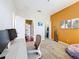 Spacious home office featuring two entrances and creative decor at 3559 Victoria Pines Dr # 280, Orlando, FL 32829