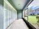 Screened patio with sliding glass doors and views of the community grounds at 3559 Victoria Pines Dr # 280, Orlando, FL 32829