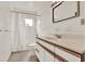 Bright bathroom featuring a single sink vanity and shower with curtain at 3716 Neptune Dr, Orlando, FL 32804