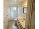 Bathroom featuring white walls, and shower and tub combo at 3716 Neptune Dr, Orlando, FL 32804