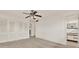 Bedroom with neutral carpet, ceiling fan, and closet at 3716 Neptune Dr, Orlando, FL 32804