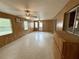 Enclosed sun room featuring wood paneling, and ceiling fans at 3716 Neptune Dr, Orlando, FL 32804