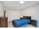 Comfortable bedroom with light floors, dark furnishings, and closet at 378 Cedarbrook Ln, Altamonte Springs, FL 32714