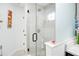 Modern shower with glass door, rain shower head, and neutral tiling at 378 Cedarbrook Ln, Altamonte Springs, FL 32714