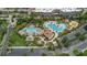 Aerial view of resort-style pools, lush landscaping, and convenient parking at 4001 Breakview Dr # D409, Orlando, FL 32819
