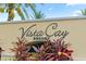 Vista Cay Resort sign surrounded by colorful tropical plants at 4001 Breakview Dr # D409, Orlando, FL 32819