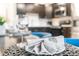 Elegant dining table setup with silverware and woven placemats at 4001 Breakview Dr # D409, Orlando, FL 32819