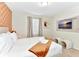 Bedroom with king bed, accent wall, and flat screen TV at 4021 Lana Ave, Davenport, FL 33897
