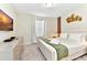 Beautifully decorated bedroom with a TV, soft linens, bedside tables, and decor pieces for a stylish retreat at 4021 Lana Ave, Davenport, FL 33897