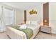Stylishly decorated bedroom features a cozy bed, elegant furnishings, and a serene ambiance for a restful retreat at 4021 Lana Ave, Davenport, FL 33897