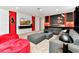 Living room featuring a large gray sectional and fun Mickey Mouse decor at 4021 Lana Ave, Davenport, FL 33897