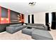 Spacious living room with large gray sectional and Mickey Mouse themed decor at 4021 Lana Ave, Davenport, FL 33897