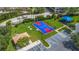 Overhead view of community amenities, featuring a basketball court, playground, and picnic area at 4114 Breakview Dr # 110, Orlando, FL 32819