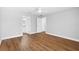This bedroom features a ceiling fan, light gray walls and new flooring at 449 Timmonsville Way, The Villages, FL 32162