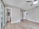 Light filled bedroom with ceiling fan and sliding glass door leading to a balcony at 458 Spring Ln, Ocala, FL 34472