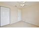 Neutral bedroom with double door closet and plenty of space at 4901 Stone Acres Cir, St Cloud, FL 34771