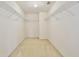 Walk-in closet with carpet, wire shelving, and ample storage space at 4901 Stone Acres Cir, St Cloud, FL 34771