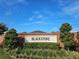 Stone 'Blackstone' community sign surrounded by lush landscaping at 4901 Stone Acres Cir, St Cloud, FL 34771