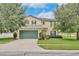 Charming two-story home with a two car garage and landscaped yard at 4901 Stone Acres Cir, St Cloud, FL 34771