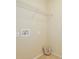 This laundry room features tile flooring and a wired shelf at 4901 Stone Acres Cir, St Cloud, FL 34771