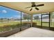 Relax on this screened-in patio while enjoying the beautiful pond view at 4901 Stone Acres Cir, St Cloud, FL 34771