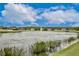 This pond offers a water fountain feature and community views at 4901 Stone Acres Cir, St Cloud, FL 34771