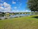 Community homes with pond view on a sunny day at 4901 Stone Acres Cir, St Cloud, FL 34771