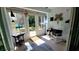 Cozy sunroom with lots of windows, lots of light, and a rocking chair at 525 Oak Ter # 117, Altamonte Springs, FL 32701