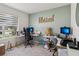 Bright bedroom featuring a dedicated workspace and natural light at 585 Talisi Loop, St Cloud, FL 34771