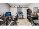 Spacious bedroom designed for gaming, with multiple monitors and ample space at 585 Talisi Loop, St Cloud, FL 34771