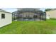 Expansive backyard with pool, shed, and ample green space at 605 Elbridge Dr, Kissimmee, FL 34758