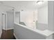 Hallway with a chandelier and view of downstairs at 605 Elbridge Dr, Kissimmee, FL 34758