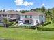 Well-kept backyard featuring a pool, lounge seating, and manicured landscaping at 6905 Cucamelon Ct, Windermere, FL 34786